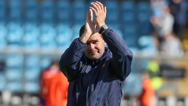 David Healy applauds the Linfield supporters following the Showgrounds contest