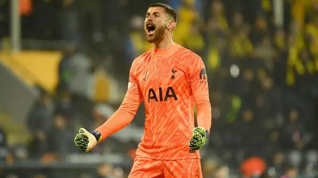 Vicario in action for Tottenham 