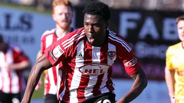 Tony Yogane in action for Exeter City