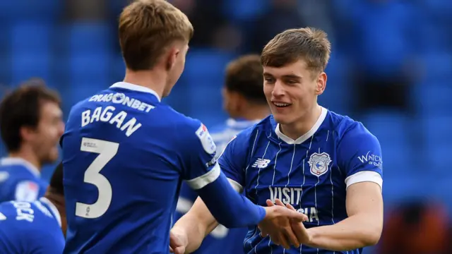 Joel Bagan and Dylan Lawlor celebrate a Cardiff City goal