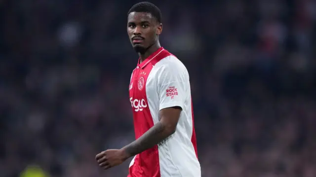 Jorrel Hato #4 of Ajax looks on in the second half of the UEFA Europa League 2024/25 Round of 16 First Leg match between AFC Ajax and Eintracht Frankfurt at Johan Cruyff Arena 