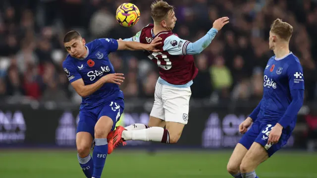 West Ham's Jarrod Bowen attempts to win a header against Everton