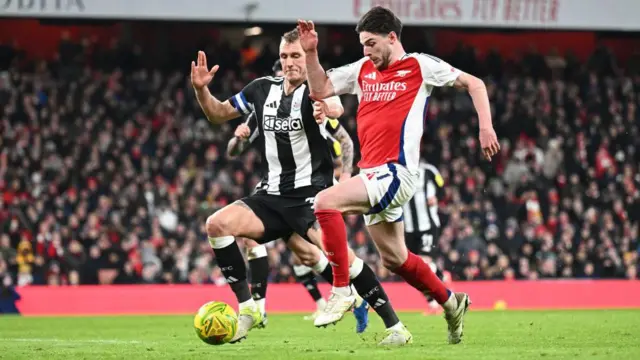 Dan Burn puts pressure on Declan Rice