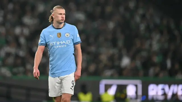 Erling Haaland puffs out cheeks after missing penalty