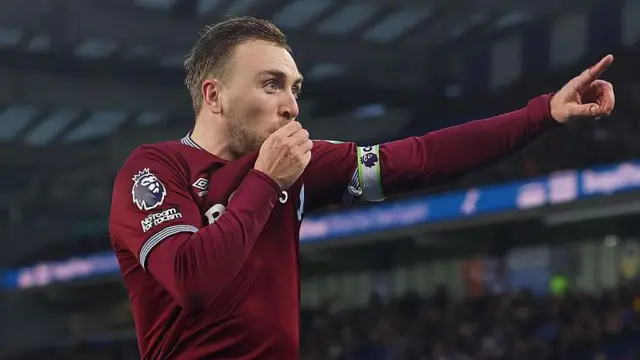 West Ham captain Jarrod Bowen pointing and kissing the badge