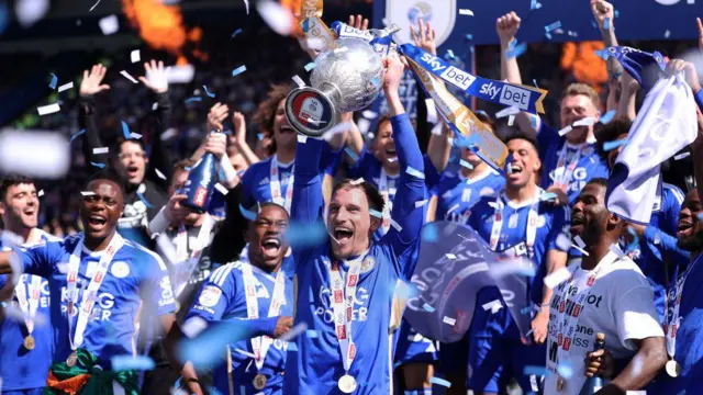 Marc Albrighton lifts the Championship trophy during the Sky Bet Championship match between Leicester City and Blackburn Rovers at The King Power Stadium on May 04, 2024