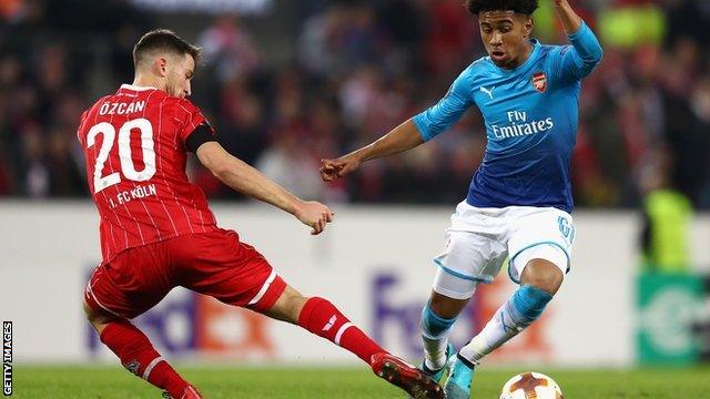 Reiss Nelson in action for Arsenal against Cologne