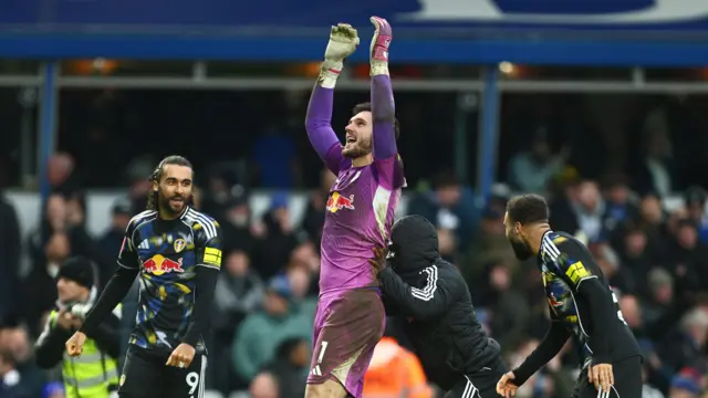 Leeds goalkeeper Lucas Perri celebrates their FA Cup win over Birmingham with his team-mates.