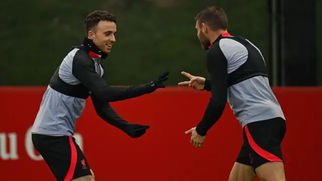 Diogo Jota and James Milner of Liverpool during a training session