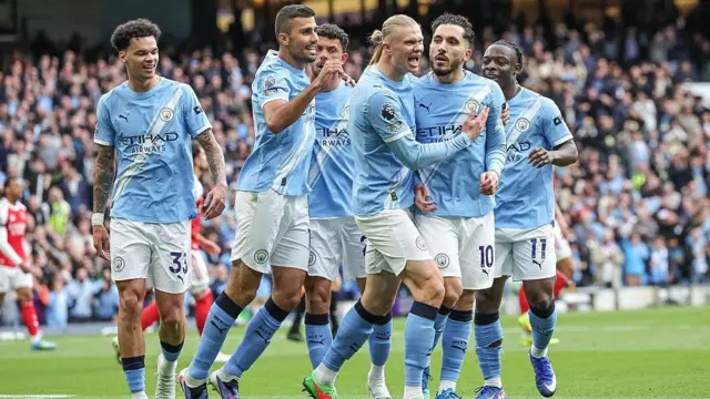 Manchester City players celebrate 