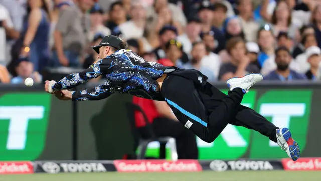 Alex Ross of the Strikers unable to hold a catch during the BBL match between Adelaide Strikers and Perth Scorchers at Adelaide Oval