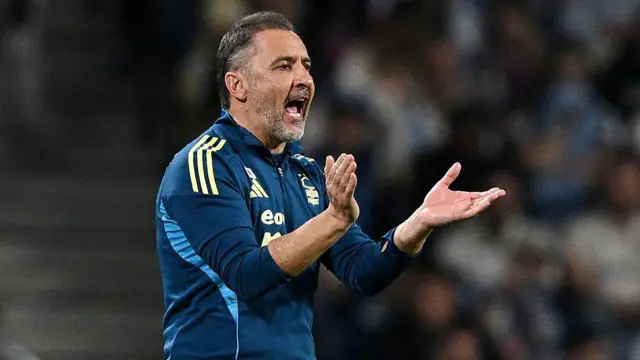 Vitor Pereira, manager of Nottingham Forest, claps during the match.