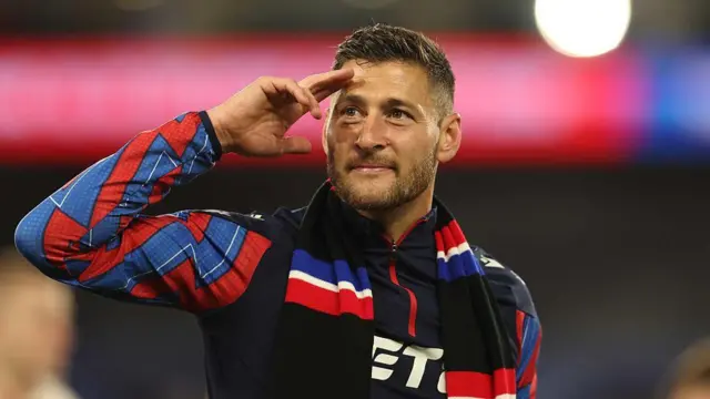 Joel Ward of Crystal Palace salutes the Crystal Palace fans