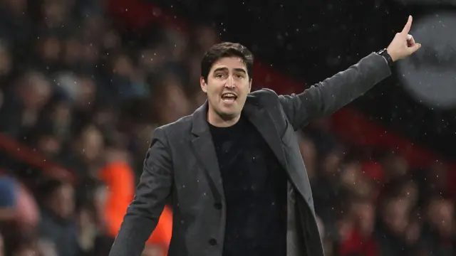 Andoni Iraola gives instructions from the touchline