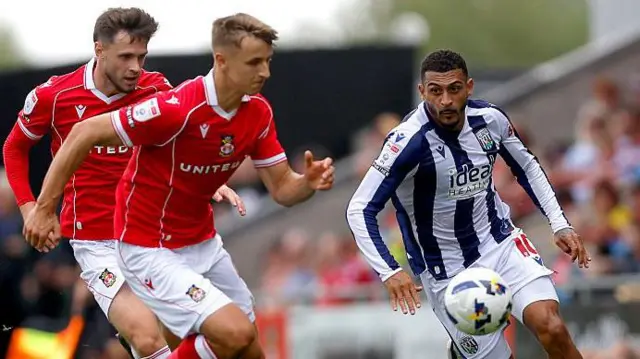 West Brom's Karlan Grant tries to get past Wrexham's Max Cleworth