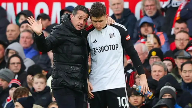 Marco Silva speaks with Tom Cairney