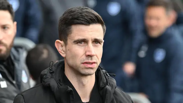 Eric Ramsay looking on from the touchline