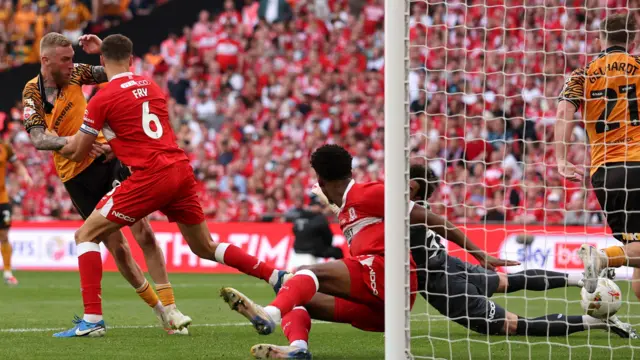 Hull City's Oli McBurnie scores against Middlesbrough