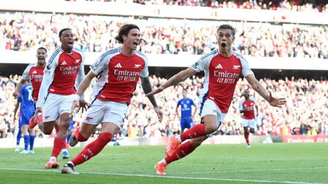 Leandro Trossard celebrates scoring Arsenal's third goal versus Leicester City