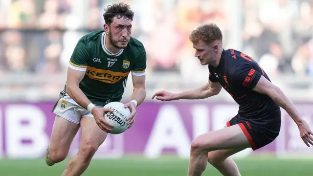 Paudie Clifford in possession for Kerry