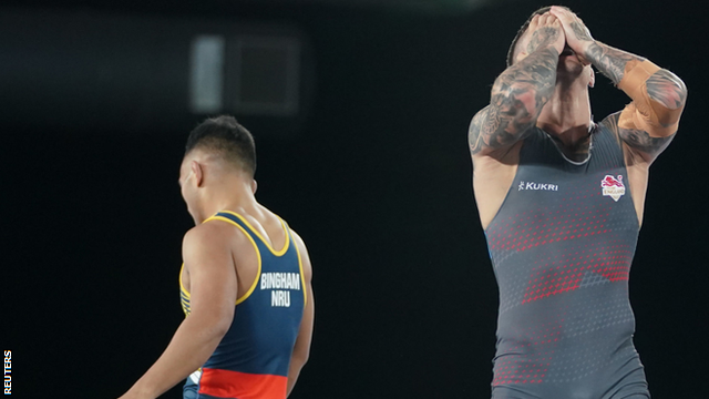 England's George Ramm (right) reacts after winning a bronze medal at the Commonwealth Games