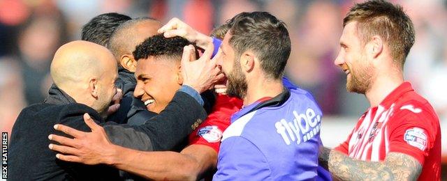 Ollie Watkins (centre)