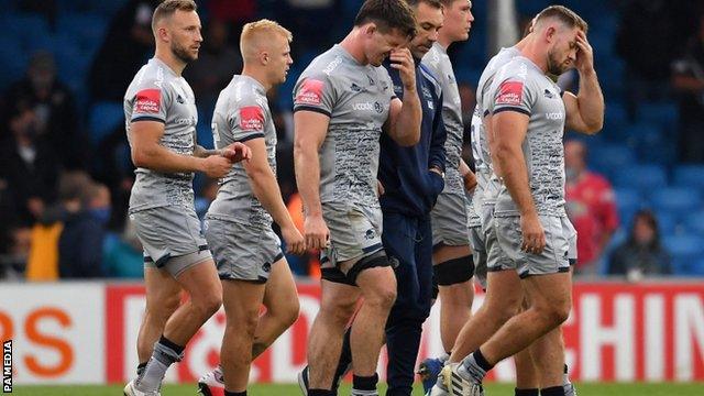 Sale players look dejected after defeat by Exeter