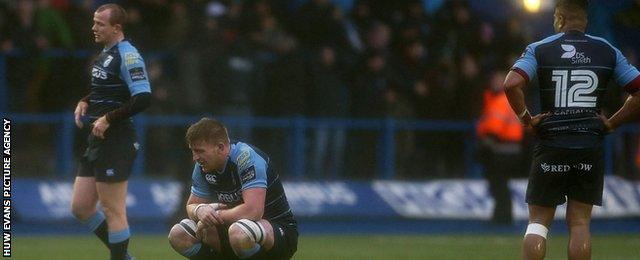 Blues players look dejected after their 14-13 defeat by Leinster