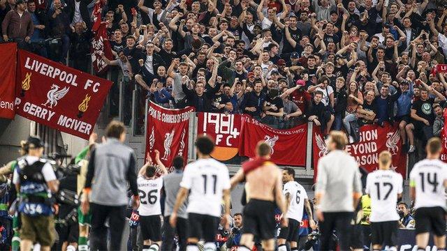 Liverpool's players celebrate reaching the Champions League final