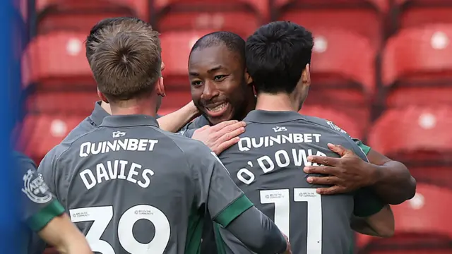 Cardiff City's Yakou Meite (centre) celebrates with team-mates