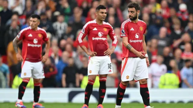 Bruno Fernandes and Casemiro of Manchester United show dejection