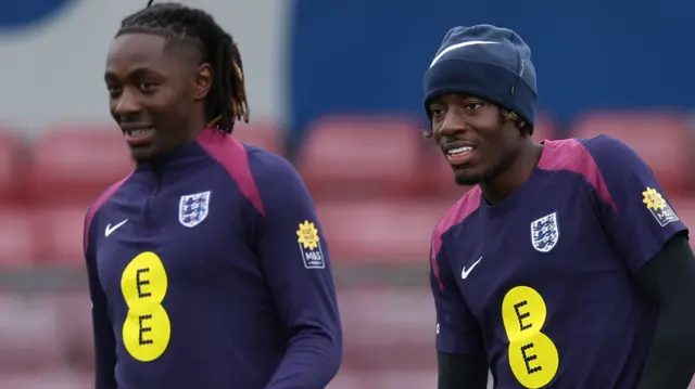 Eberechi Eze and Noni Madueke in England training tops
