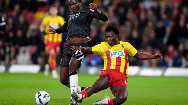 Watford's Nestory Irankunda challenges for the ball 