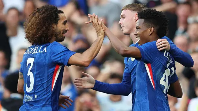 Marc Cucurella celebrates with Estevao Willian and Cole Palmer