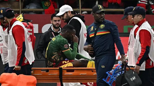 Cameroon's Junior Tchamadeu is stretchered off during the Africa Cup of Nations quarter-final against Morocco