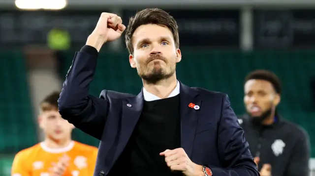 Danny Rohl celebrates at Easter Road