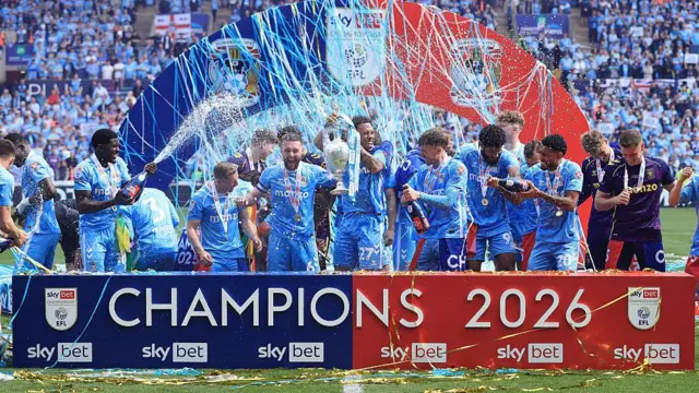 Coventry City players celebrate promotion 