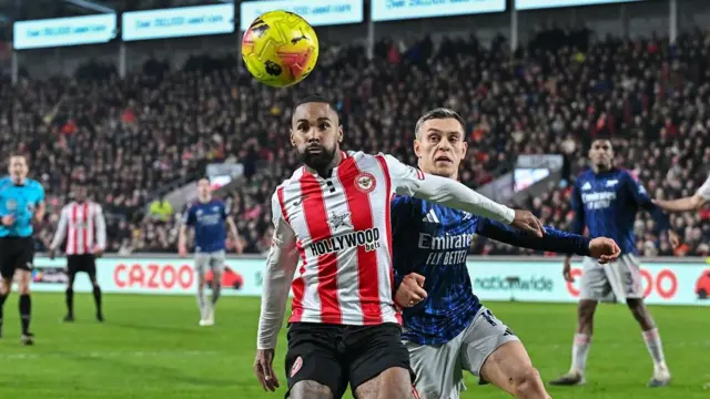 Rico Henry and Leandro Trossard