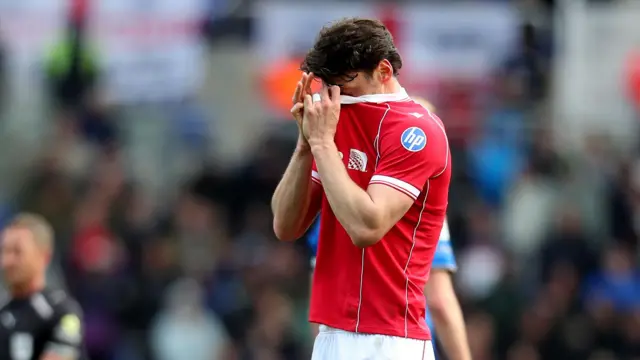 Wrexham's Kieffer Moore looks dejected