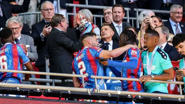 Majority Crystal Palace owner John Textor with Steve Parish as Crystal Palace players lift the FA Cup