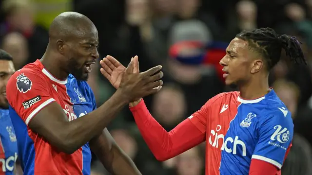 Jean-Philippe Mateta of Crystal Palace celebrates after scoring his second goal with Michael Olise of Crystal Palace during the Premier League match between Crystal Palace and Newcastle United at Selhurst Park