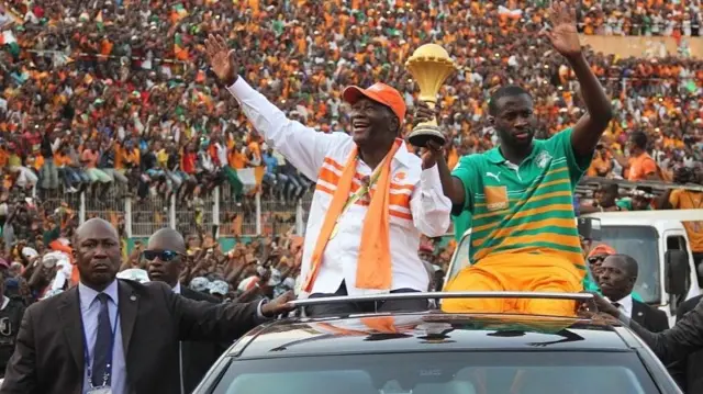 Yaya Toure (right) with Ivory Coast president Alassane Ouattara