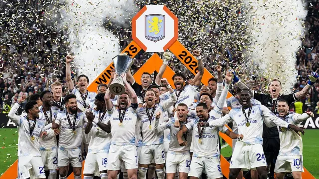 Aston Villa players celebrate winning the Europa League