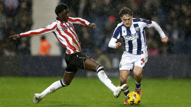 Stoke City's Jesurun Rak-Sakyi (L) and West Brom's Callum Styles