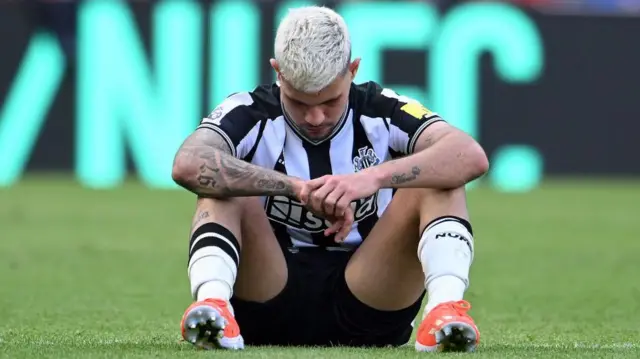 Bruno Guimaraes reacts after the full-time whistle