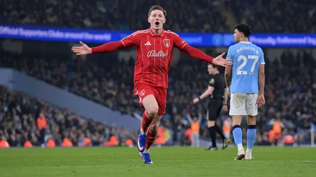 Elliot Anderson celerbates a goal against Manchester City