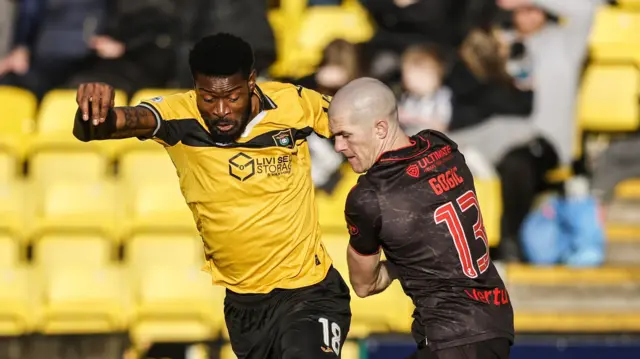 Livingston's Jeremy Bokila and St Mirren's Alex Gogic