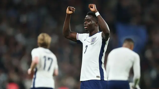 Bukayo Saka celebrates scoring England's third goal against Wales