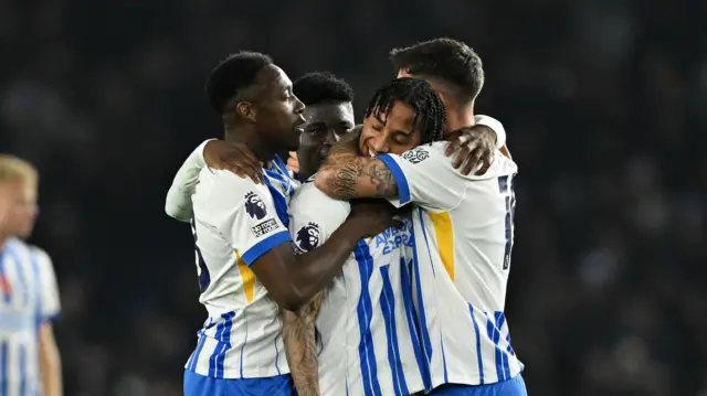 Brighton players celebrate win against Manchester City