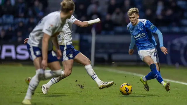 Derby's Bobby Clark is on the ball with two Preston players ahead of him